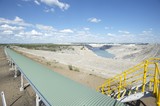 Mining Photo Stock Library - covered, overland, coal conveyor with mine workings in background and pedestrian overpass in foreground. ( Weight: 1  New Image: NO)