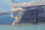 Mining Photo Stock Library - Aerial photo of stockpiled coal at coal terminal. Bulldozer 's working around stockpiles. ( Weight: 1  New Image: NO)