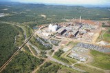 Mining Photo Stock Library - aerial photo of a bauxite and alumina refinery.  wide shot showing plant and conveyor system from shippng wharf. ( Weight: 1  New Image: NO)