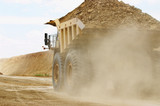Mining Photo Stock Library - close up photo of a loaded haul truck moving in open cut mine ( Weight: 1  New Image: NO)