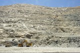 Mining Photo Stock Library - really wide shot at ground level of deep open cut mine.  excavator loading haul truck and dozer standing by.  high walls of pit stretch up to blue sky.  great wide photo for two, double page spread or placement of copy. ( Weight: 1  New Image: NO)