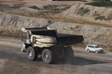 Mining Photo Stock Library - haul truck and light vehicle pass on haul road in open cut mine site. ( Weight: 1  New Image: NO)