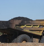 Mining Photo Stock Library - close up photo of loaded coal haul truck moving on haul road at open cut mine site. ( Weight: 1  New Image: NO)