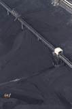 Mining Photo Stock Library - vertical aerial photo of dozer stockpiling coal into hopper at coal terminal.  overhead conveyors.  coal to all edges of photo. ( Weight: 1  New Image: NO)
