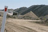 Mining Photo Stock Library - haul truck on haul road in open cut mine.  shot at road level.  great shot for double page spread with room for copy on right side. ( Weight: 1  New Image: NO)