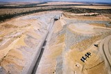 Mining Photo Stock Library - aerial photo of coal mine with haul trucks parked at go line in foreground. ( Weight: 1  New Image: NO)