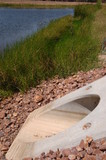 Mining Photo Stock Library - vertical image of a concrete culvert pipe outlet into planted water storage dam on mine site. ( Weight: 1  New Image: NO)