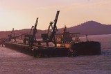 Mining Photo Stock Library - aerial dusk afternoon photo of shiploader loading coal at wharf. ( Weight: 1  New Image: NO)