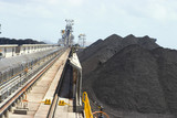 Mining Photo Stock Library - coal spreader and reclaimer at terminal.  shot looking along tracks with coal stockpiles adjacent. ( Weight: 1  New Image: NO)