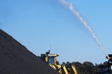 Mining Photo Stock Library - water being sprayed onto coal stockpile to reduce dust suppression. ( Weight: 1  New Image: NO)