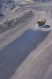 Mining Photo Stock Library - water cart spraying water on haul access road in open cut mine.  aerial photo. ( Weight: 1  New Image: NO)
