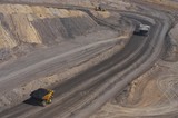Mining Photo Stock Library - loaded haul truck with coal following haul truck with overburden in open cut coal mine.  aerial shot. ( Weight: 1  New Image: NO)