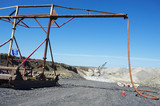 Mining Photo Stock Library - dragline working in background removing overburden with drill rigs drilling blast holes and in foreground the dragline cable mast. open cut coal mine Bowen Basin Queensland.  ( Weight: 1  New Image: NO)