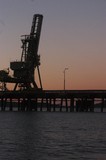 Mining Photo Stock Library - bulk ship loader at a wharf during sunset.  vertical format. ( Weight: 1  New Image: NO)