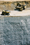 Mining Photo Stock Library - aerial vertical shot of excavator loading haul trucks in open cut coal mine.  high walls and coal seam below. ( Weight: 1  New Image: NO)