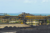 Mining Photo Stock Library - wide photo of coal stockpiles at shipping coal terminal.  overhead conveyors clearly seen. ( Weight: 1  New Image: NO)