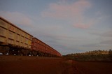Mining Photo Stock Library - iron ore train moving through the Pilbarra at dawn. generic photo of heavy rail. ( Weight: 1  New Image: NO)
