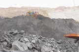 Mining Photo Stock Library - dozer pushing overburden into a stockpile in open cut mine site.  very generic photo with room for copy. ( Weight: 1  New Image: NO)