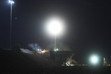 Mining Photo Stock Library - loader loading coal into a hopper for conveyor at night ( Weight: 1  New Image: NO)