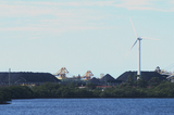 Mining Photo Stock Library - great photo of a large wind generator and in the background is a reclaimer loading stockpiles of coal.  large dam in foreground. ( Weight: 1  New Image: NO)
