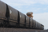 Mining Photo Stock Library - photo of long coal train unloading onto a shiploader at a port.  shot from next to train track. ( Weight: 1  New Image: NO)